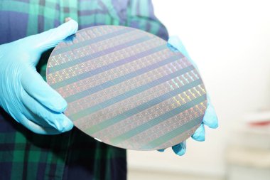 Silicon wafer for manufacturing semiconductor of integrated circuit. clipart