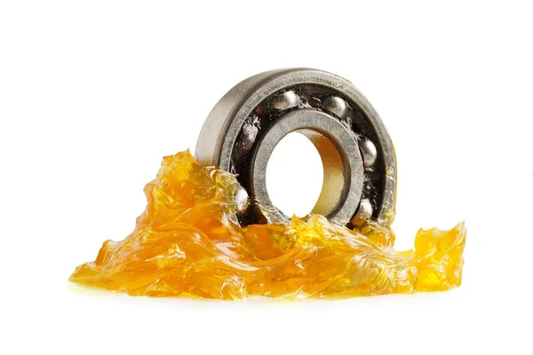 stock image Grease and ball bearing  isolated on white background with clipping path, lithium machinery lubrication for automotive and industrial.