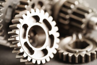 Metal dişli tekerlek motor araba ve bisiklet, mekanik endüstrisi konsepti.       