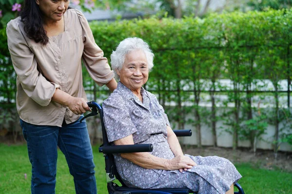 Caregiver Help Asian Elderly Woman Disability Patient Sitting Wheelchair Park — Stock Photo, Image