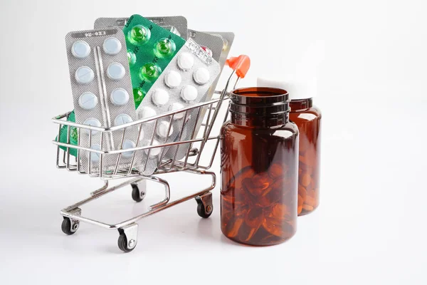 Shopping trolley with blister pill and capsule from drug prescription, pharmacy for treatment health medicine.