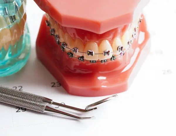 Dental appointment reminder in calendar, healthy teeth, dental health care.