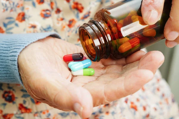 Asian Elderly Woman Holding Pill Drug Hand Strong Healthy Medical — Stock fotografie