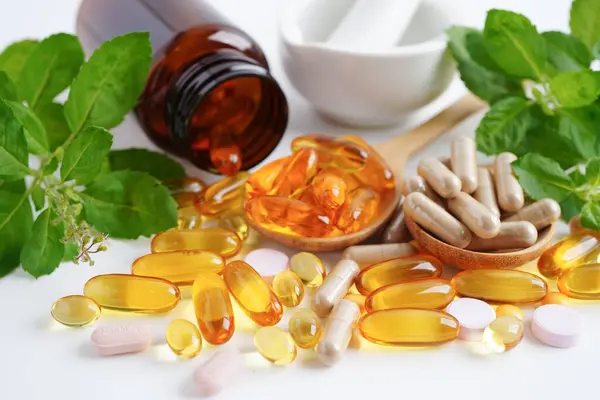 Alternative Medicine Herbal Organic Capsule Vitamin Omega Fish Oil Mineral Royalty Free Stock Images
