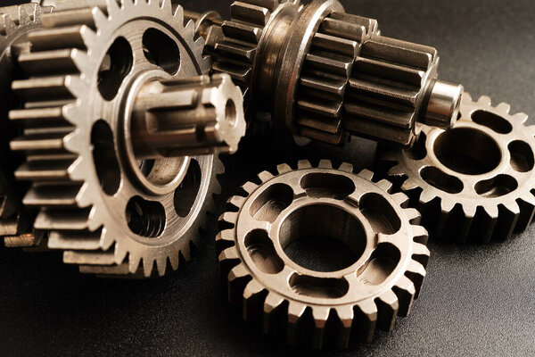 Metal gear wheel engine car and bike, mechanic industry concept.