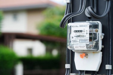 Bangkok, Thailand - May 15, 2022 Electric measuring power meter for energy cost at home and office.