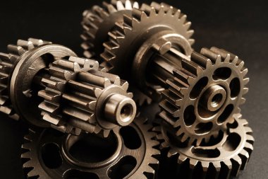 Metal dişli tekerlek motor araba ve bisiklet, mekanik endüstrisi konsepti. 