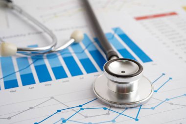 Çizelge üzerinde steteskop veya grafik kağıdı, Finansal, hesap, istatistik ve iş verileri tıbbi sağlığı.