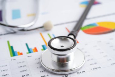 Çizelge üzerinde steteskop veya grafik kağıdı, Finansal, hesap, istatistik ve iş verileri tıbbi sağlığı.