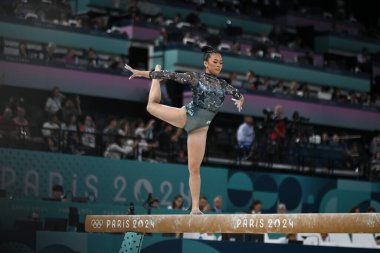 PARIS, FRANCE-July 28: Sunisa Lee  of team United States competes on the balance beam during the Artistic Gymnastics Women's Qualification at the the Olympic Games Paris 2024 at Bercy Arena on July 28 PARIS, FRANCE clipart