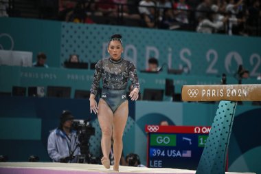 PARIS, FRANCE-July 28: Sunisa Lee  of team United States competes on the balance beam during the Artistic Gymnastics Women's Qualification at the the Olympic Games Paris 2024 at Bercy Arena on July 28 PARIS, FRANCE clipart