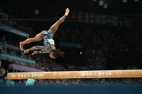 PARIS, FRANCE-July 28: Simone Biles  of team United States competes on the balance beam during the Artistic Gymnastics Women's Qualification at the the Olympic Games Paris 2024 at Bercy Arena on July 28 PARIS, FRANCE