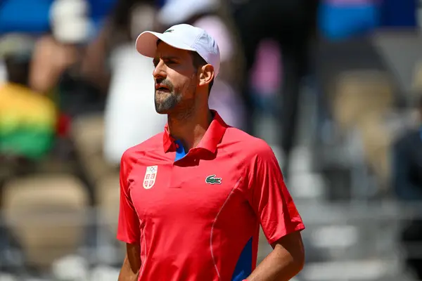 Stock image PARIS, FRANCE-July 29:  Novak Djokovic of Team Serbia competes Rafael Nadal during during the Men's Singles second round tennis match on day three of the Olympic Games Paris 2024 at Roland Garros on July 29, 2024 in Paris, France.