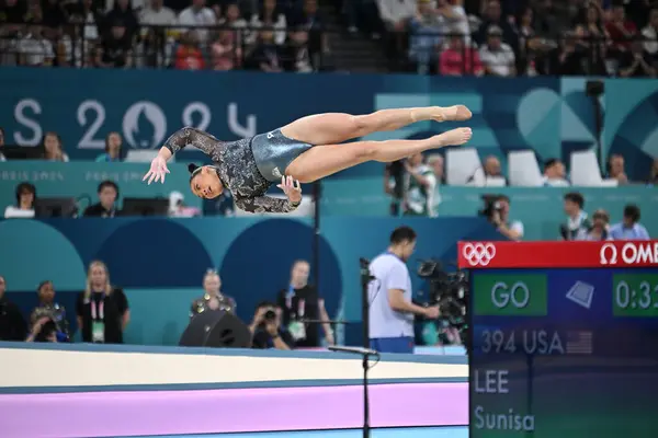 stock image PARIS, FRANCE-28 July 2024: Sunisa Lee of USA competes on the floor exercise during the Artistic Gymnastics Women's Qualification at the the Olympic Games Paris 2024 at Bercy Arena