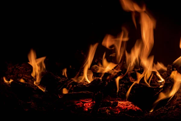 Stock image flames of fire with logs of firewood inside a fireplace autumn photos romantic photos of fire