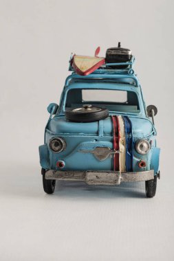 The photograph of an old blue car vintage metal figures for collection