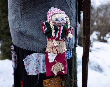 Doll as a detail of the image of a witch during the annual procession in the Austrian Gastein Valley. High quality photo
