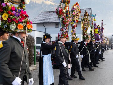 AUSTRIA, GASTEIN - January 1, 2023: formation of the participants of the perchtenlauf procession in the Austrian Gastein Valley. High quality photo