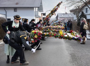 AUSTRIA, GASTEIN - January 1, 2023: bows of the participants of the Perchtenlauf procession in the Austrian Gastein Valley. High quality photo