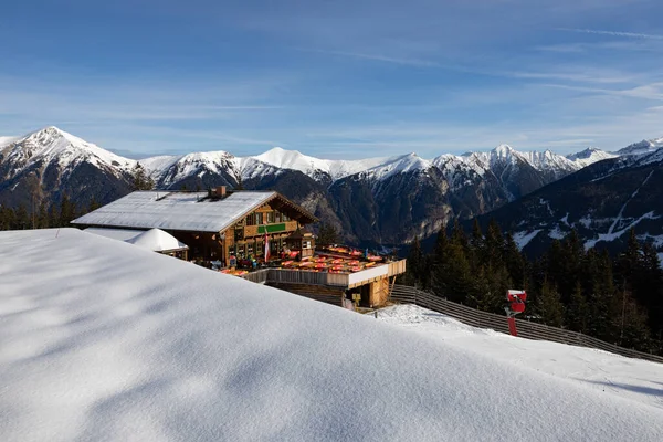 Mountain landscape with a hut for skiers in the Austrian Alps. High quality photo