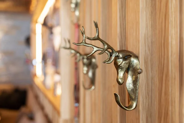 stock image Original metal hooks for outerwear, made in the form of a deer head with antlers, Austria, Salzburg. High quality photo