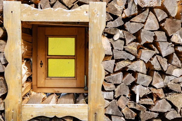 stock image Originally stacked logs with a nested window, the problem of deforestation. High quality photo