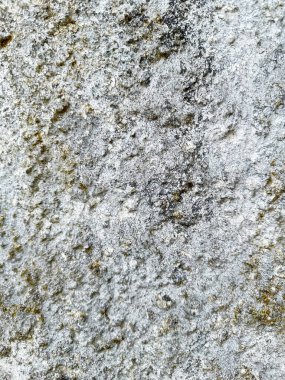 Yıpranmış ve desenli taş bir yüzeye yakın çekim