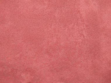 Soyut kırmızı desenli arka plan. Kırmızı kağıt arka plan, renkli kağıt dokusu. Süetin dokusu doğaldır. Kırmızı arkaplan. Soyut kırmızı arkaplan veya Noel arkaplanı. Kırmızı Duvar Doku Özgeçmişi. Renkli Grunge duvar arkaplanı..