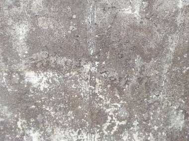 Beton duvar arka planı. Tasarımınız için grunge etkisi. Duvar koyu korkunç. Arkaplan için koyu çimento. Çiziklerle dolu korkunç bir duvar..