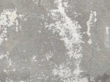 Beton duvar arka planı. Tasarımınız için grunge etkisi. Duvar koyu korkunç. Arkaplan için koyu çimento. Çiziklerle dolu korkunç bir duvar..