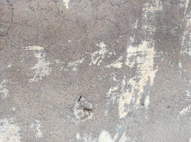 Beton duvar arka planı. Tasarımınız için grunge etkisi. Duvar koyu korkunç. Arkaplan için koyu çimento. Çiziklerle dolu korkunç bir duvar..