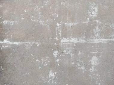 Beton duvar arka planı. Tasarımınız için grunge etkisi. Duvar koyu korkunç. Arkaplan için koyu çimento. Çiziklerle dolu korkunç bir duvar..