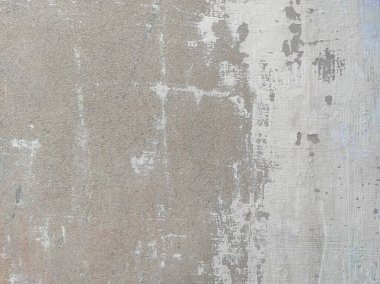 Beton duvar arka planı. Tasarımınız için grunge etkisi. Duvar koyu korkunç. Arkaplan için koyu çimento. Çiziklerle dolu korkunç bir duvar..