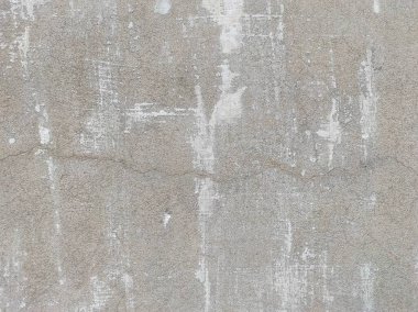 Beton duvar arka planı. Tasarımınız için grunge etkisi. Duvar koyu korkunç. Arkaplan için koyu çimento. Çiziklerle dolu korkunç bir duvar..