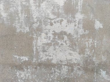 Grunge duvarı betonu ortaya çıkardı. Eski beyaz beton duvar, arka planda çok küçük çatlaklar, arka planda eski gri beton duvar dokusu. Çatlak, pürüzsüz beyaz duvar dokusu. Kirli, beyaz duvar boyası soyulmuş.. 