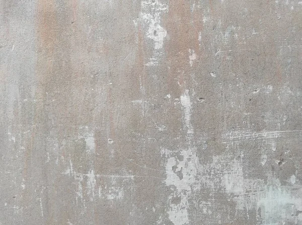 Beton duvar arka planı. Tasarımınız için grunge etkisi. Duvar koyu korkunç. Arkaplan için koyu çimento. Çiziklerle dolu korkunç bir duvar..