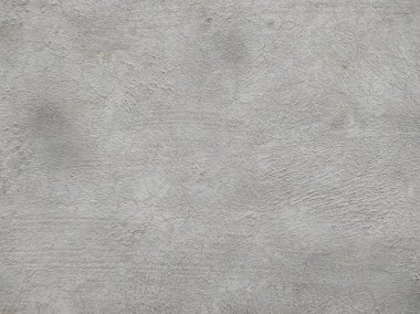 Çizik ve çatlaklarla dolu gri duvar dokusu. Grunge Arka plan dokusu Kirli Splash Duvarı. Eski beton duvarın dokusu. Açık gri renkten beton duvar. Çizikler ve çatlaklarla eski grunge dokuları.