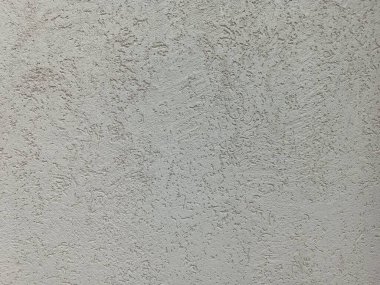 Arka plan için eski gri beton duvar dokusu. Stucco duvar arkaplanı. Desen, tasarımınız için grunge etkisi yaratmak üzere bir nesnenin üzerine yerleştirilmiş. Yüksek çözünürlüklü taş ve beton zemin. Koyu çimento arka plan..