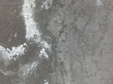 Arka plan için eski gri beton duvar dokusu. Stucco duvar arkaplanı. Desen, tasarımınız için grunge etkisi yaratmak üzere bir nesnenin üzerine yerleştirilmiş. Yüksek çözünürlüklü taş ve beton zemin. Koyu çimento arka plan..