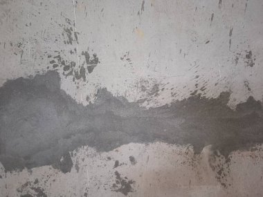 Arka plan için eski gri beton duvar dokusu. Stucco duvar arkaplanı. Desen, tasarımınız için grunge etkisi yaratmak üzere bir nesnenin üzerine yerleştirilmiş. Yüksek çözünürlüklü taş ve beton zemin. Koyu çimento arka plan..