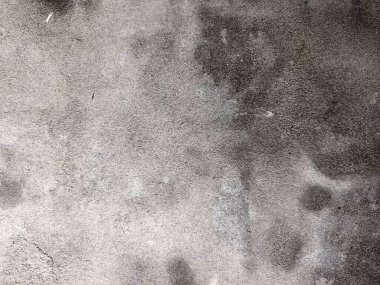 Siyah ve beyaz arka plan pankartıyla eski grunge dokusu, kirli sıkıntılı koyu gri kenarları ve nötr olarak açık gri merkezi. Eski beton duvar dokusu. Açık gri çimento desenli beton duvar. Gri çatallı çimento dokusu..