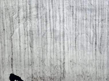 Beyaz grunge lekeleri ve sınır grisi arkaplanı olan yumuşak harmanlanmış fırça darbelerindeki soyut pürüzlü pürüzlü pürüzlü doku. Çizik ve çatırtı içeren arka plan veya doku. Kraterleştirilmiş duvar dokusu arka plan, grunge desen arka plan..