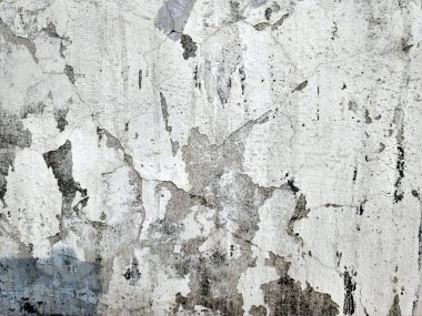 Beyaz grunge lekeleri ve sınır grisi arkaplanı olan yumuşak harmanlanmış fırça darbelerindeki soyut pürüzlü pürüzlü pürüzlü doku. Çizik ve çatırtı içeren arka plan veya doku. Kraterleştirilmiş duvar dokusu arka plan, grunge desen arka plan..
