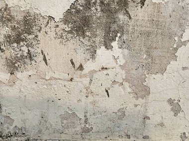 Beyaz grunge lekeleri ve sınır grisi arkaplanı olan yumuşak harmanlanmış fırça darbelerindeki soyut pürüzlü pürüzlü pürüzlü doku. Çizik ve çatırtı içeren arka plan veya doku. Kraterleştirilmiş duvar dokusu arka plan, grunge desen arka plan..