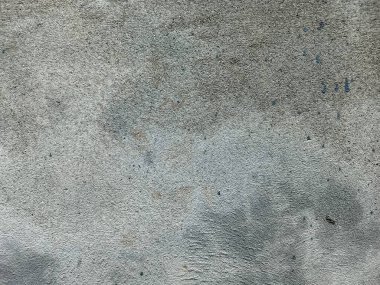 Kirli çatlamış beyaz duvar boyası dökülüyor. Kötü hasar görmüş eski duvar boyası soyuluyor. Boya parçaları kayıp. Çimento soyulmuş grunge duvar dokusundan sıyrılmış..