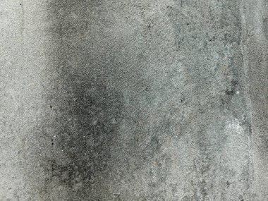 Kirli çatlamış beyaz duvar boyası dökülüyor. Kötü hasar görmüş eski duvar boyası soyuluyor. Boya parçaları kayıp. Çimento soyulmuş grunge duvar dokusundan sıyrılmış..