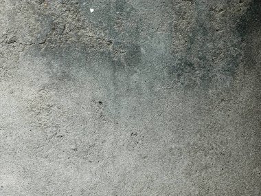 Kirli çatlamış beyaz duvar boyası dökülüyor. Kötü hasar görmüş eski duvar boyası soyuluyor. Boya parçaları kayıp. Çimento soyulmuş grunge duvar dokusundan sıyrılmış..