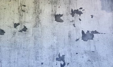 Soyut ve pürüzlü mavi duvar dokusu arkaplanı. Duvar dokusunun farklı tonlarına sahip. Vintage grunge doku iç dekorasyonu, eski dekoratif desen kaba tasvir edilmiş mistik dokular. Boya Duvarının Soyulması.