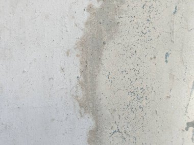 Eski beton duvarın dokusu. Açık gri çimento desenli beton duvar. Gri pastel, çatlak, çimento, beton, taş, sıva, duvar, boyalı düz zemin. Yüksek çözünürlüklü, beton zemin.