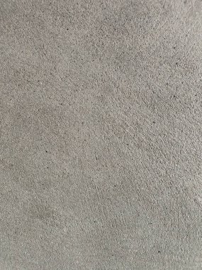Eski beton duvarın dokusu. Açık gri çimento desenli beton duvar. Gri pastel, çatlak, çimento, beton, taş, sıva, duvar, boyalı düz zemin. Yüksek çözünürlüklü, beton zemin.